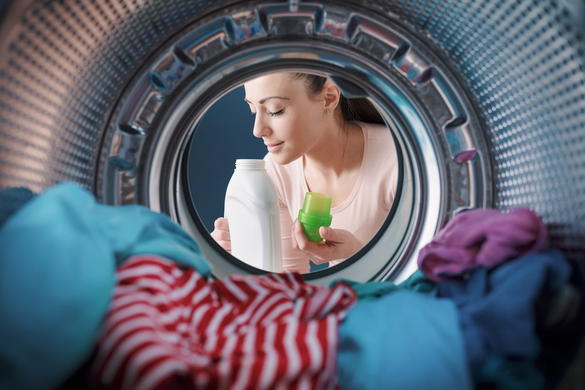 woman-smelling-a-scented-laundry-detergent-2023-11-27-04-54-58-utc.jpg__PID:797c5b4c-8f08-4632-b150-5707e9ae6f9c
